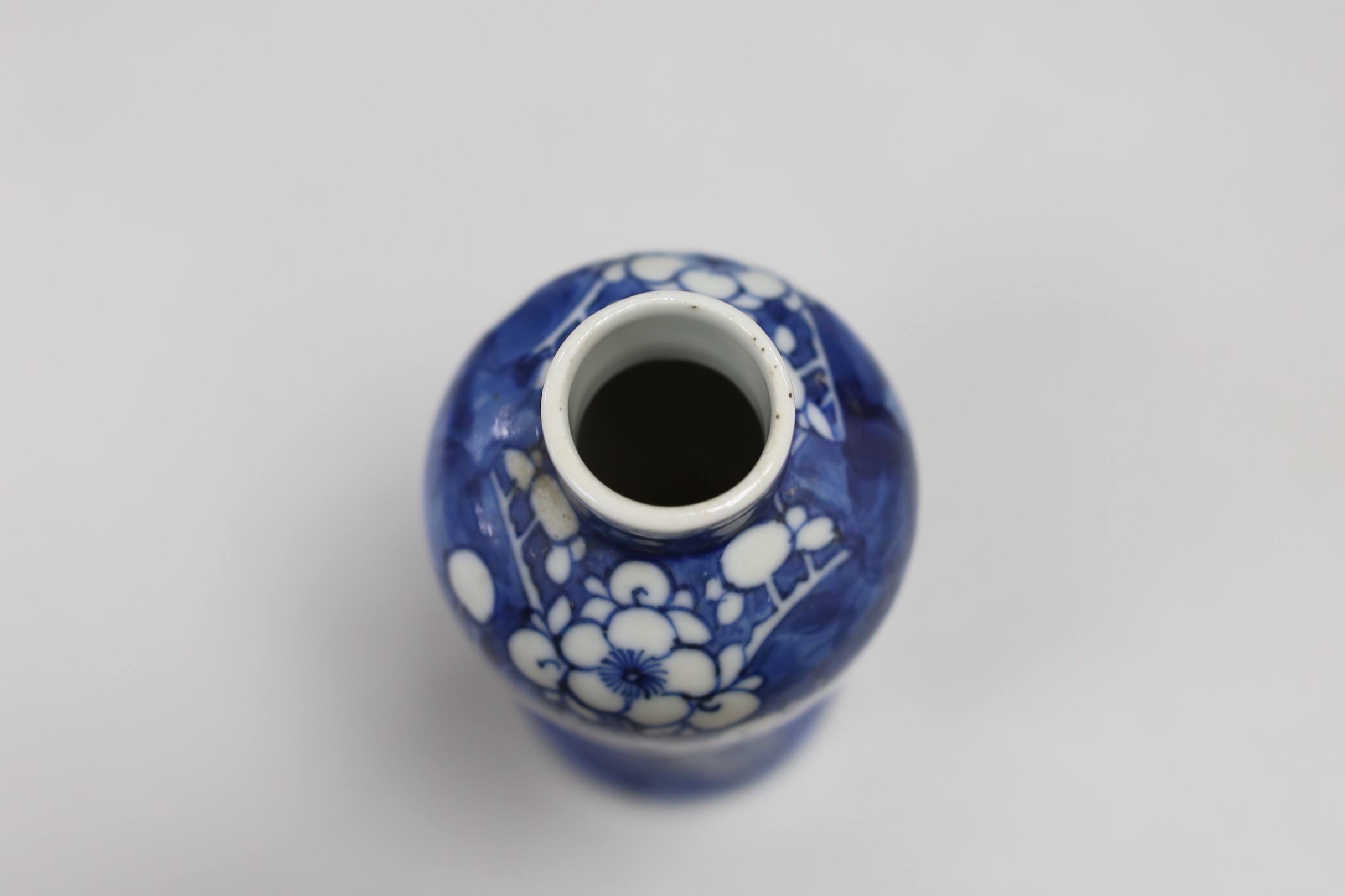 A small 19th century Chinese blue and white prunus vase. 13.5cm tall